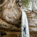 A student climbs a frozen waterfall during Ice Fest on February 15.